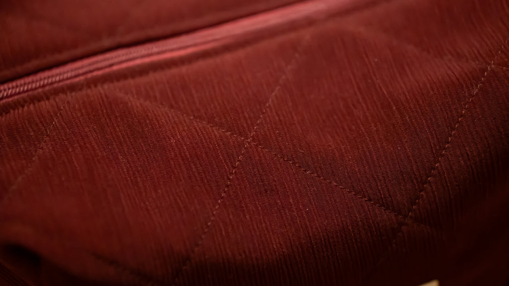 Close-up of a textured red fabric surface