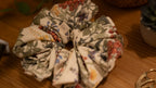 Floral patterned scrunchie on a wooden surface